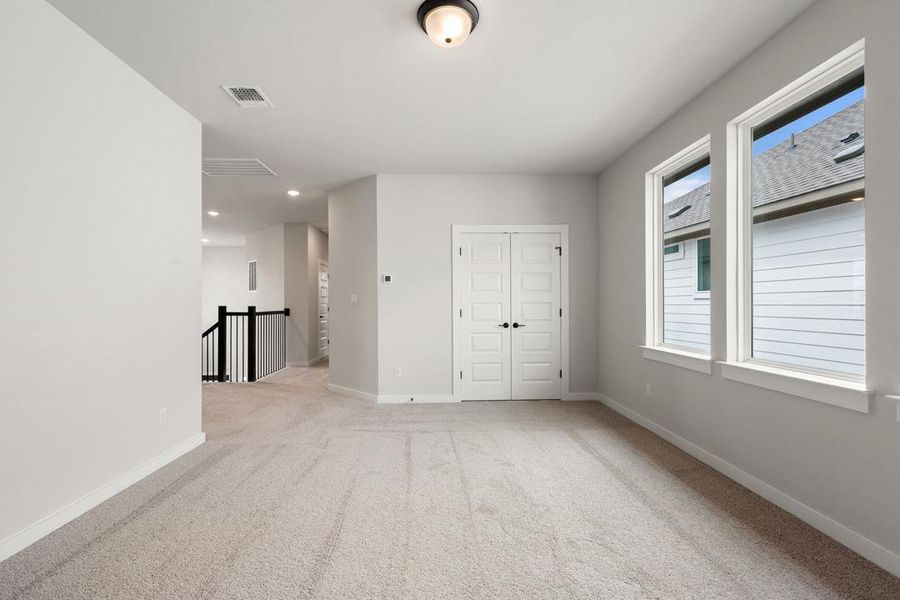 Spacious, unfurnished interior of a new home in Heritage, Dripping Springs (Image 37).