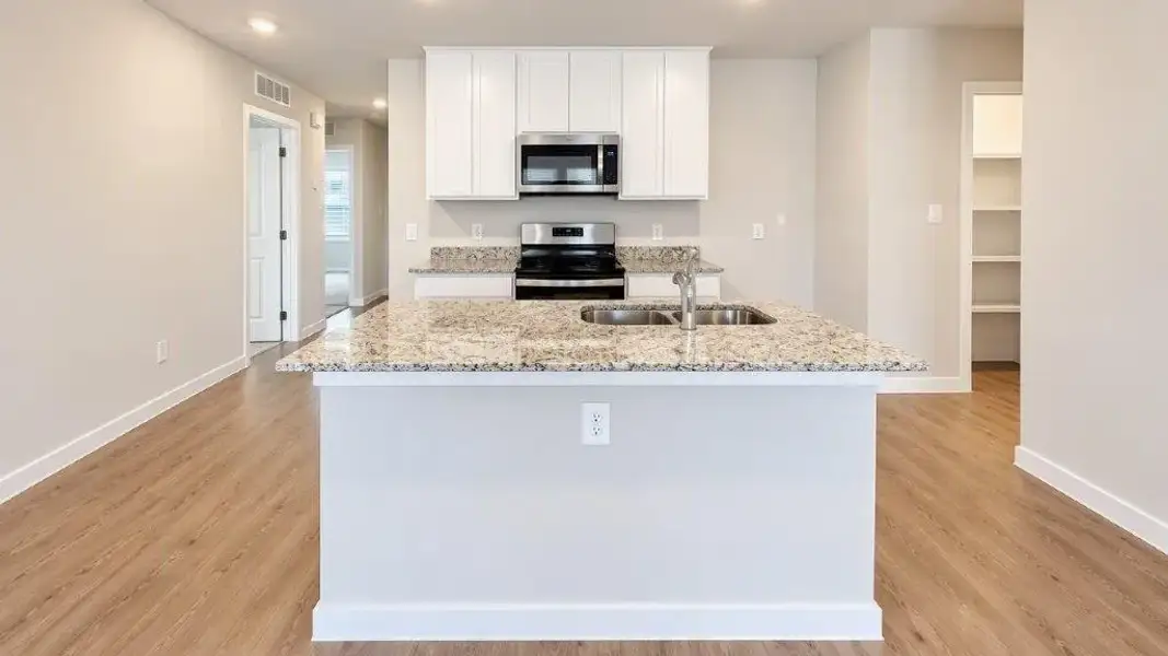 Furnished interior view inside a new home in Fisher's Cove, Aransas Pass (Image 4).