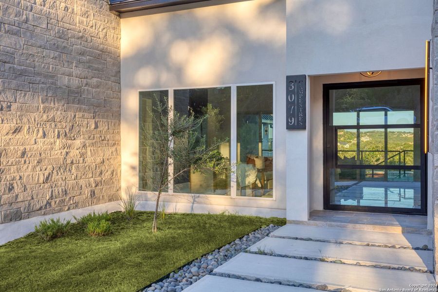 Exterior details and patio area of a home in , Spring Branch (Image 33).