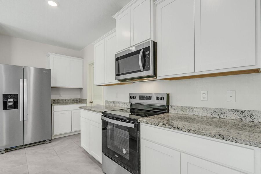 Furnished interior view inside a new home in , Port St. Lucie (Image 3).