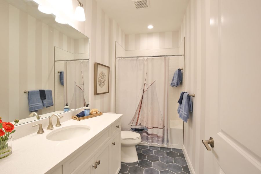 Representative furnished interior of a home built from the Sandcastle 2 by Neal Communities in Boca Royale Golf & Country Club at Wellen Park, Englewood (Image 19).