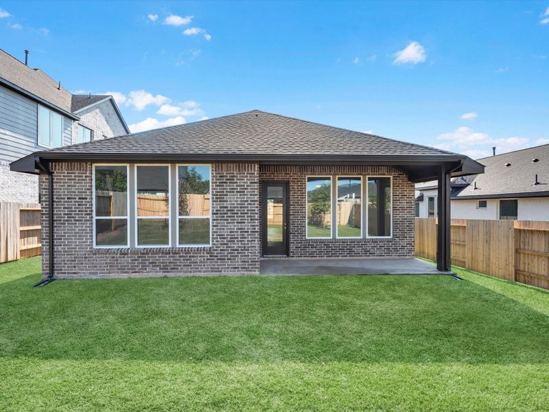 Exterior details and patio area of a home in Garden Glen at Clopton Farms, Montgomery (Image 3).