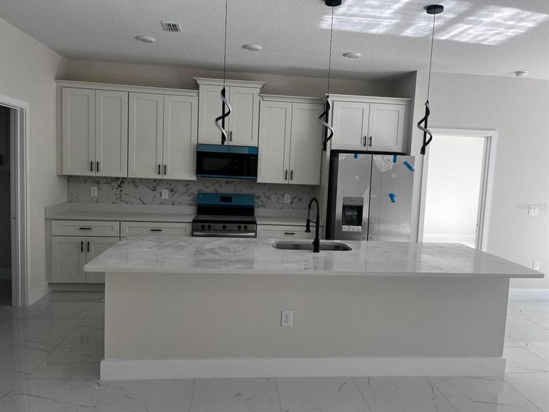 Furnished interior view inside a new home in , Port Charlotte (Image 4).