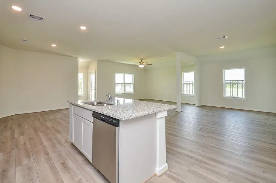 Furnished interior view inside a new home in Sunterra, Katy (Image 7).