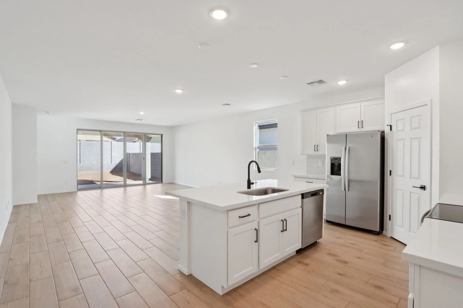 Great room, dining and kitchen