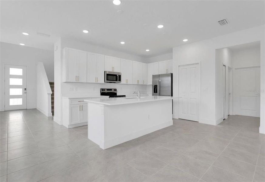 Furnished interior view inside a new home in Yucatan Gardens, Orlando (Image 8).