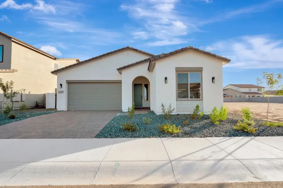 Front exterior of a new home in Soleo, San Tan Valley, AZ, highlighting curb appeal (Image 2). Front exterior of a new home in Soleo, San Tan Valley, AZ, highlighting curb appeal (Image 2).