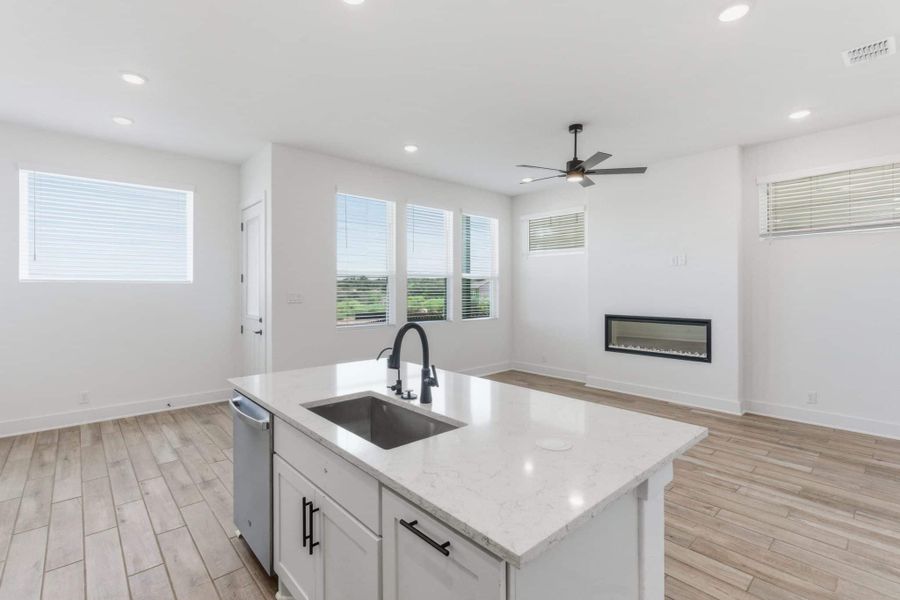 Furnished interior view inside a new home in Centero at Stone Oak, San Antonio (Image 9).
