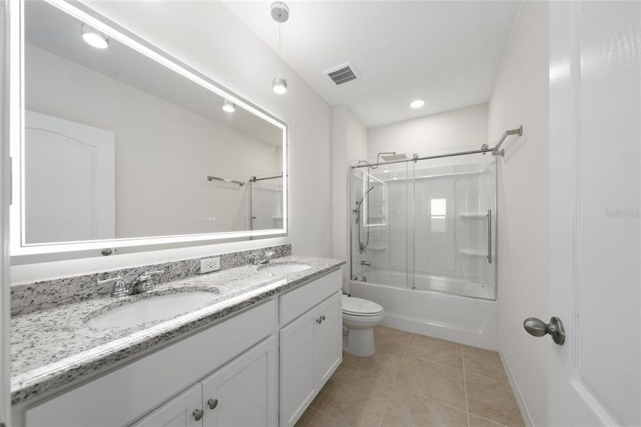 Furnished interior view inside a new home in Cascades, Davenport (Image 16).