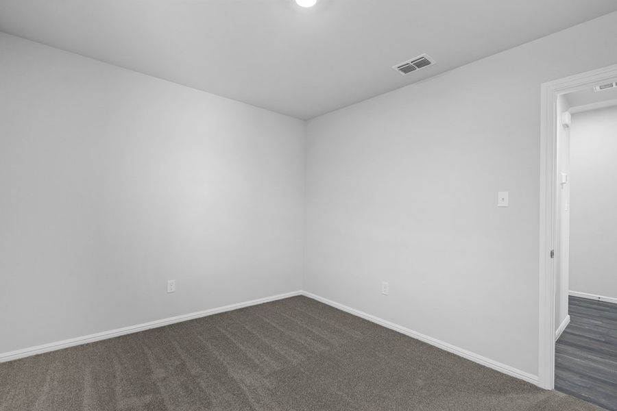 Representative unfurnished interior of a home built from the BELLVUE by D.R. Horton in Faculty Row, Abilene (Image 51).
