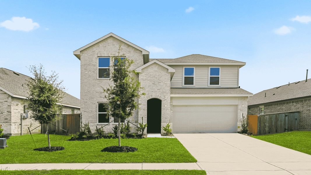 Front exterior of a new home in River Ranch Trails, Dayton, TX, highlighting curb appeal (Image 1). Front exterior of a new home in River Ranch Trails, Dayton, TX, highlighting curb appeal (Image 1).