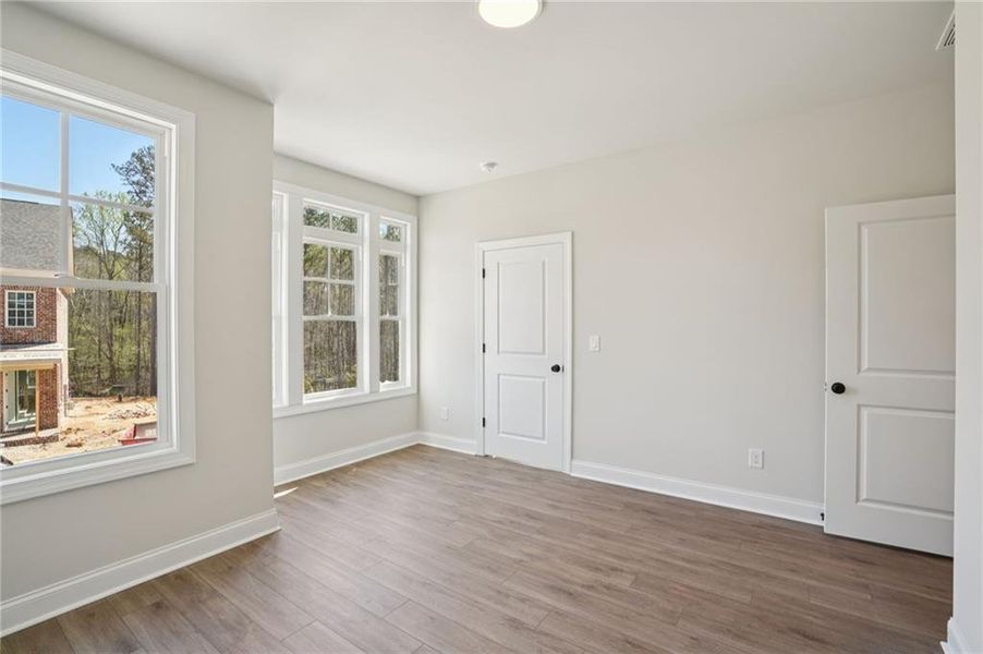 Spacious, unfurnished interior of a new home in Waterside Townhomes, Peachtree Corners (Image 41).