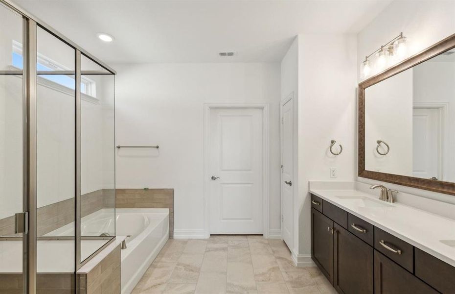 Oversized shower in owner's bathroom *real home pictured