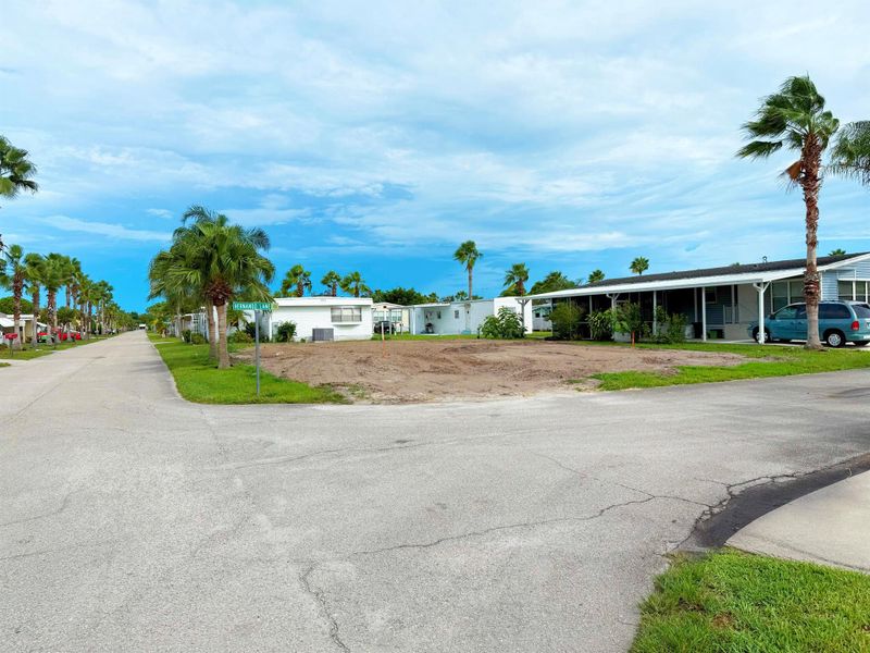 Front exterior of a new home in , Port St. Lucie, FL, highlighting curb appeal (Image 14).