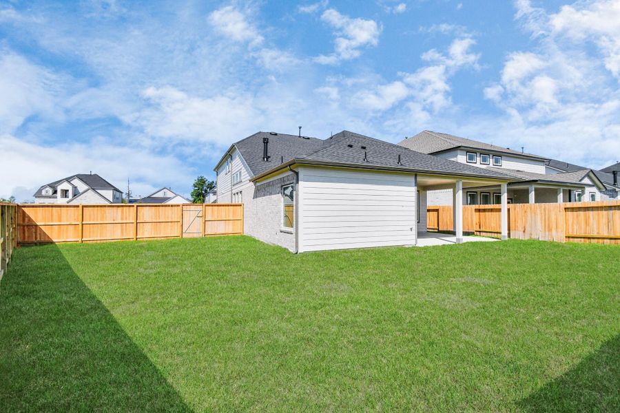 Come and see this spacious backyard with its beautiful covered patio. There is plenty of room for the kids to play and adults to relax. Perfect for your outdoor living space, patio furniture, bbq pit, and so much more. The possibilities are endless! Come and see this spacious backyard with its beautiful covered patio. There is plenty of room for the kids to play and adults to relax. Perfect for your outdoor living space, patio furniture, bbq pit, and so much more. The possibilities are endless!