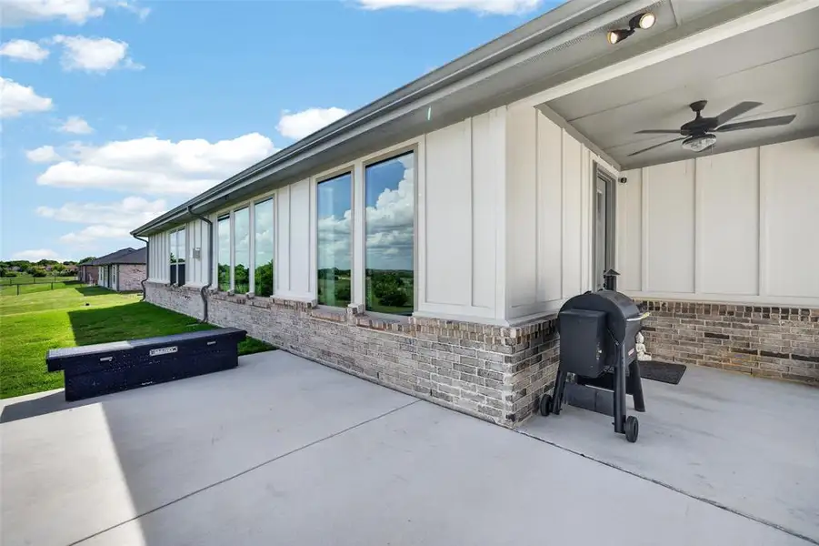 Exterior details and patio area of a home in Gatlin Ranch, Springtown (Image 28).