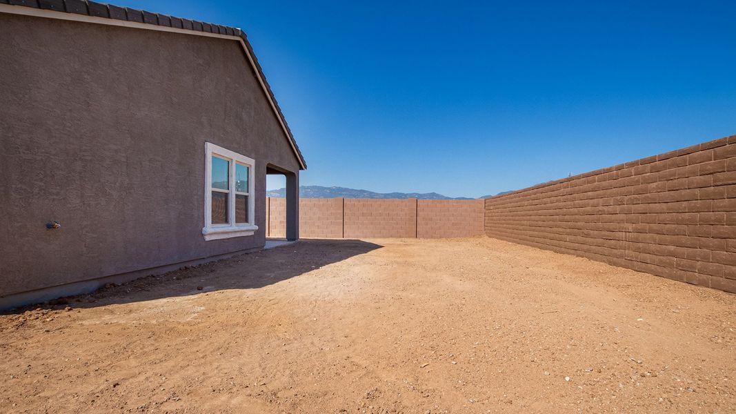 Representative exterior photo of a completed home built from the Baxter by D.R. Horton in The Oasis at Rocking K, Vail, AZ (Image 19).