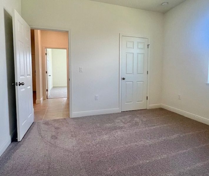 Spacious, unfurnished interior of a new home in Lakes At St Sebastian, Micco (Image 15).