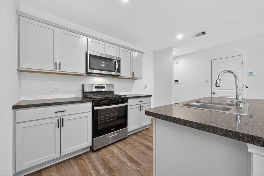 Furnished interior view inside a new home in Breckenridge Forest, Spring (Image 3).