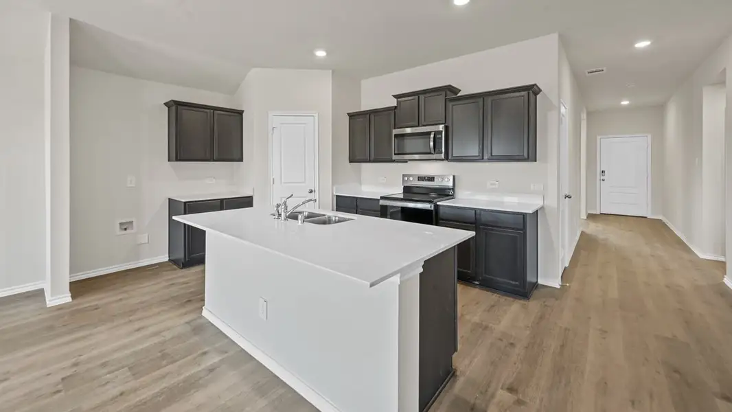 Representative furnished interior of a home built from the Texas Cali by D.R. Horton in Cottonwood, Dorchester (Image 4).