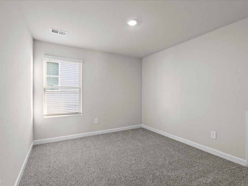 Spacious, unfurnished interior of a new home in Brayfield Manor - Heritage Collection, Wellford (Image 17).