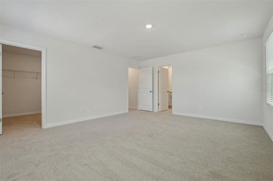Spacious, unfurnished interior of a new home in Bradford Park, Ormond Beach (Image 22).