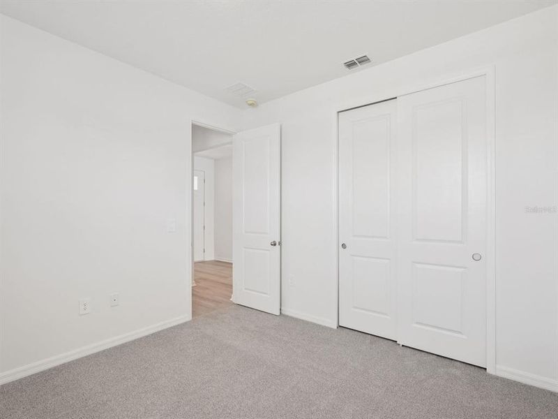 Spacious, unfurnished interior of a new home in Coasterra - Reserve Series, Palmetto (Image 33).