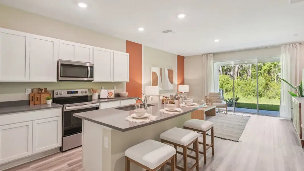 Furnished interior view inside a new home in Towns at Woodsdale, Wesley Chapel (Image 13).