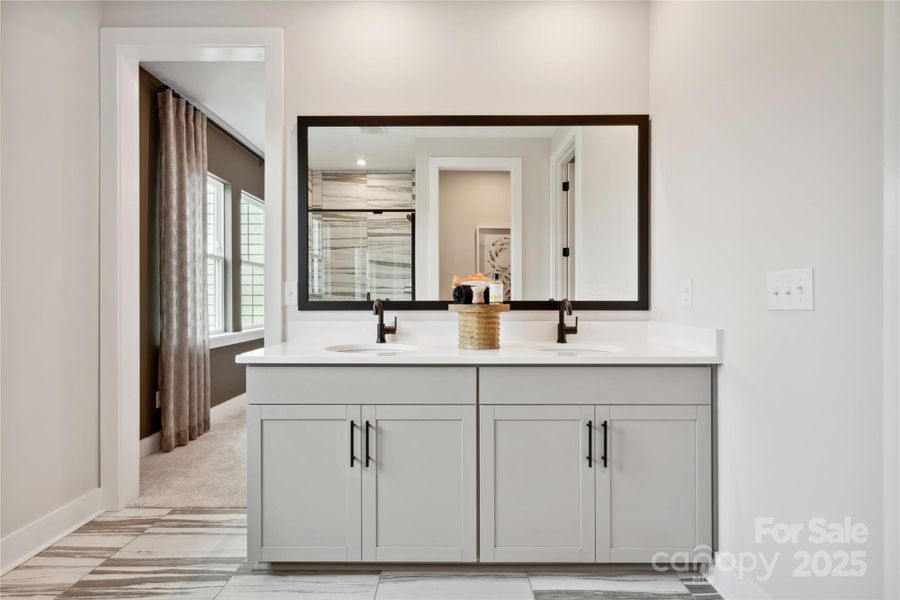 Dual vanity with loads of storage space. *Model Photos | Actual finishes, structural selections, and orientation may vary. Dual vanity with loads of storage space. *Model Photos | Actual finishes, structural selections, and orientation may vary.