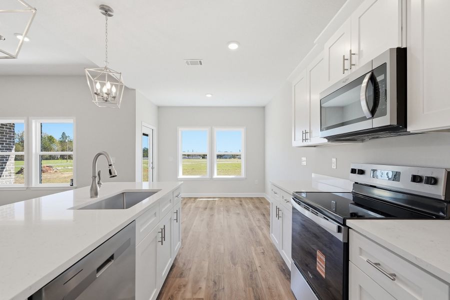 Furnished interior view inside a new home in McCarthy Estates, Defuniak Springs (Image 12).