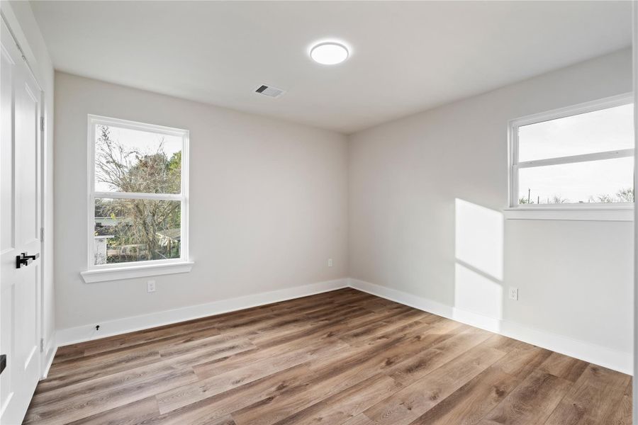 This secondary bedroom feels bright and welcoming with natural light and a layout that’s easy to personalize. Perfect for guests, a nursery, or a work-from-home setup, it offers comfort and flexibility.