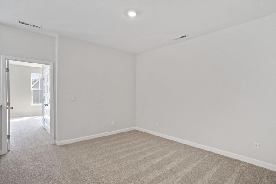 Spacious, unfurnished interior of a new home in Ovation at Sweetbrier, Durham (Image 23).