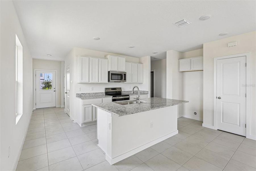 Furnished interior view inside a new home in Hamilton Bluff, Haines City (Image 7).