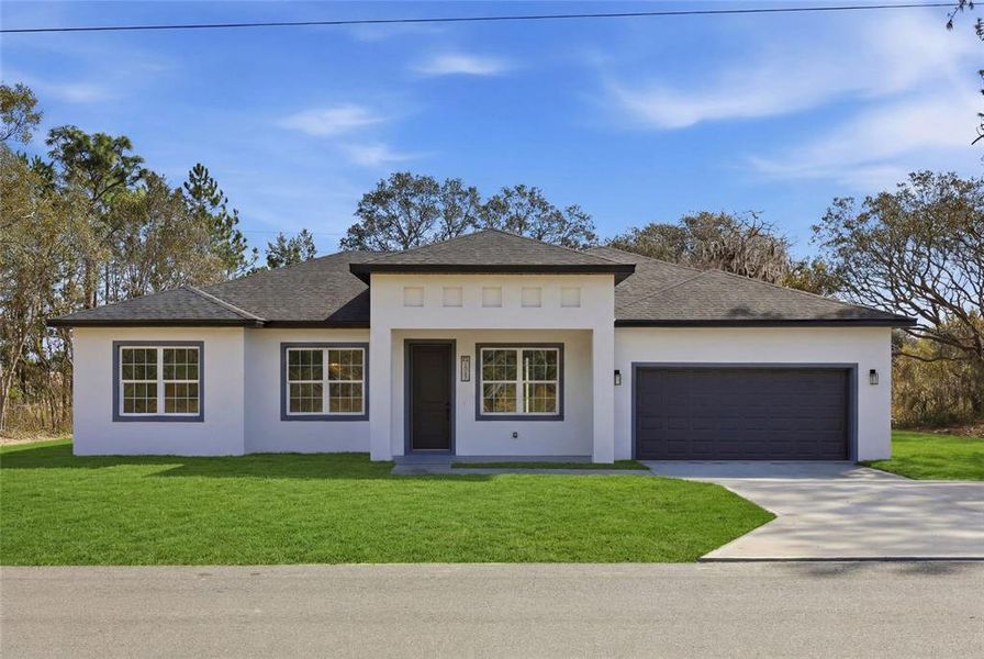 Front exterior of a new home in , Ocala, FL, highlighting curb appeal (Image 26).