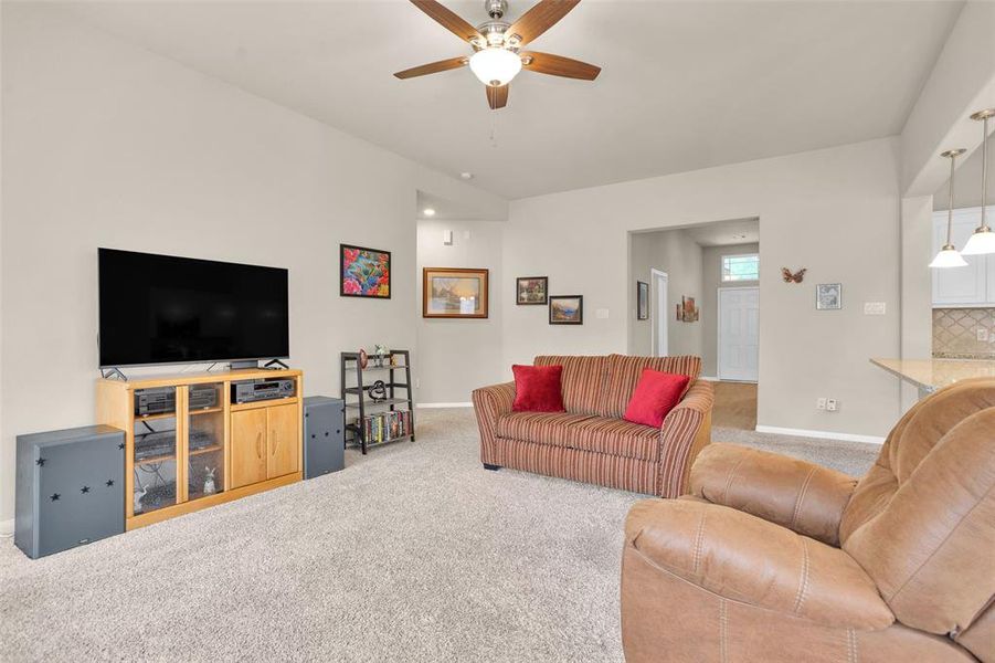 Living area with primary bedroom to your left