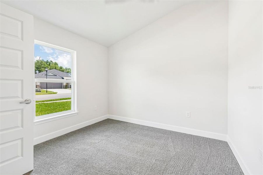 Spacious, unfurnished interior of a new home in Abbey Glen, Dade City (Image 49).