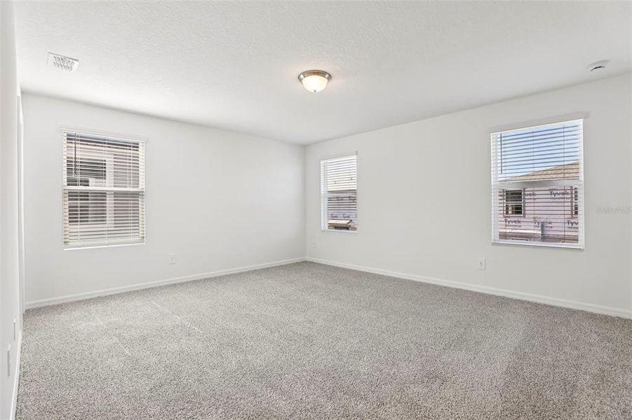 Spacious, unfurnished interior of a new home in The Meadow at Crossprairie Townes, St. Cloud (Image 19).