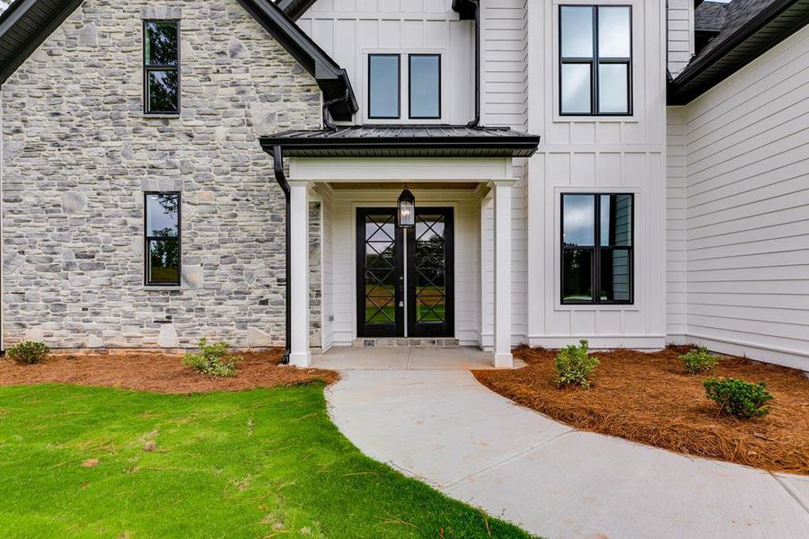 Front exterior of a new home in Harmon Springs, Carrollton, GA, highlighting curb appeal (Image 26).