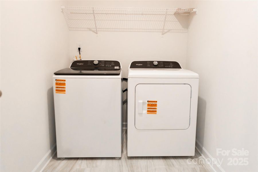 Laundry room with washer and dryer