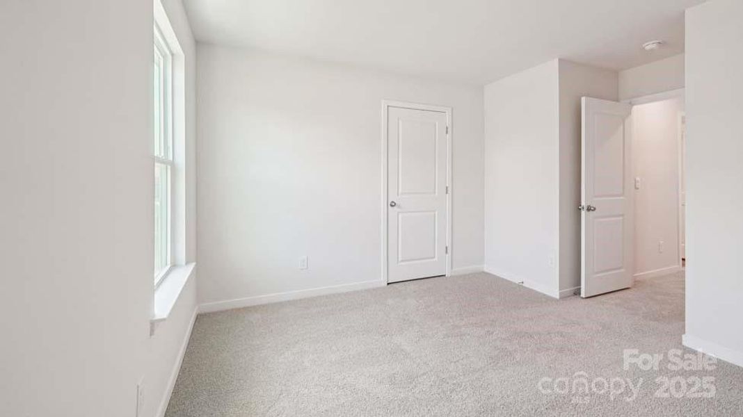 Spacious, unfurnished interior of a new home in Cardinal Creek, Charlotte (Image 21).