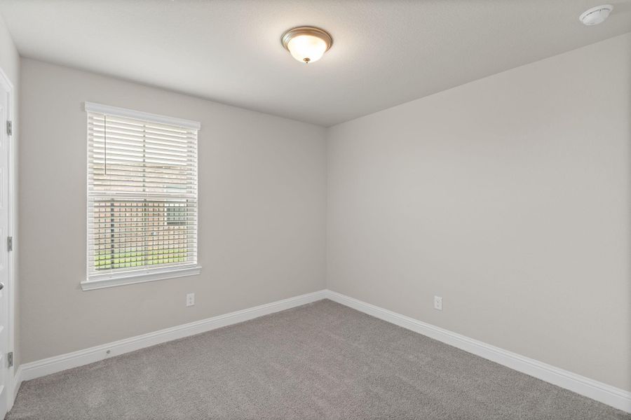 Spacious, unfurnished interior of a new home in Sunterra, Katy (Image 17).