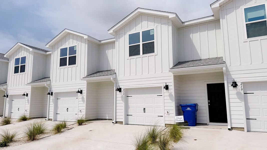 Front exterior of a new home in Salt Creek Townhomes at Mexico Beach, Mexico Beach, FL, highlighting curb appeal (Image 19).