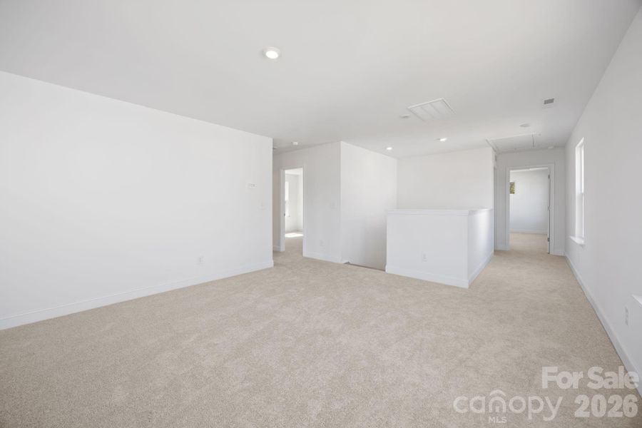 Spacious, unfurnished interior of a new home in Farms at Bellingham, Mooresville (Image 22).