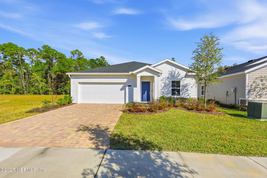 Front exterior of a new home in , Green Cove Springs, FL, highlighting curb appeal (Image 2). Front exterior of a new home in , Green Cove Springs, FL, highlighting curb appeal (Image 2).
