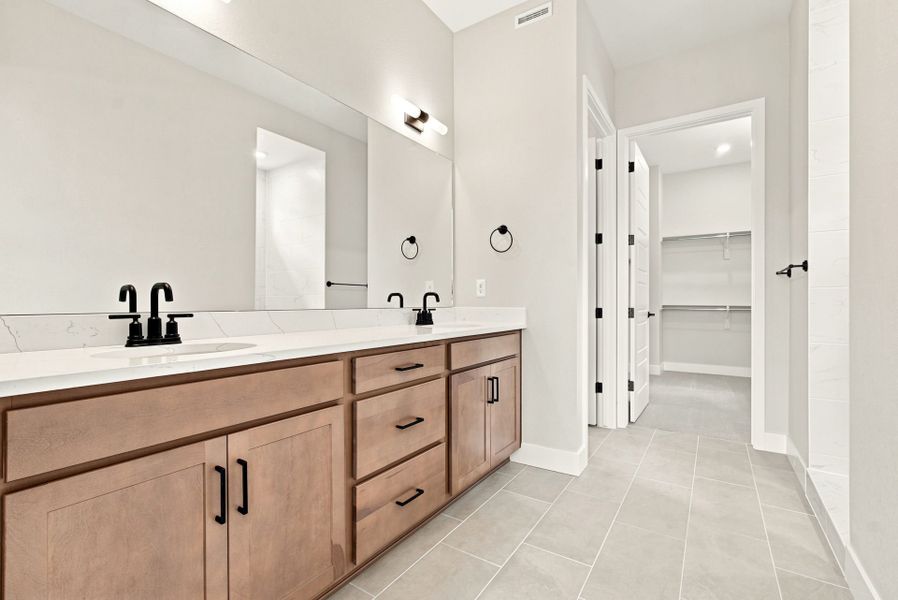 Furnished interior view inside a new home in Hilltop at Inspiration, Aurora (Image 4).