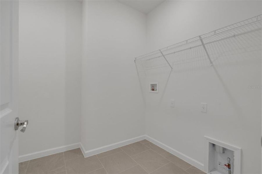 Spacious, unfurnished interior of a new home in Brystol North at Wylder, Port St. Lucie (Image 17).