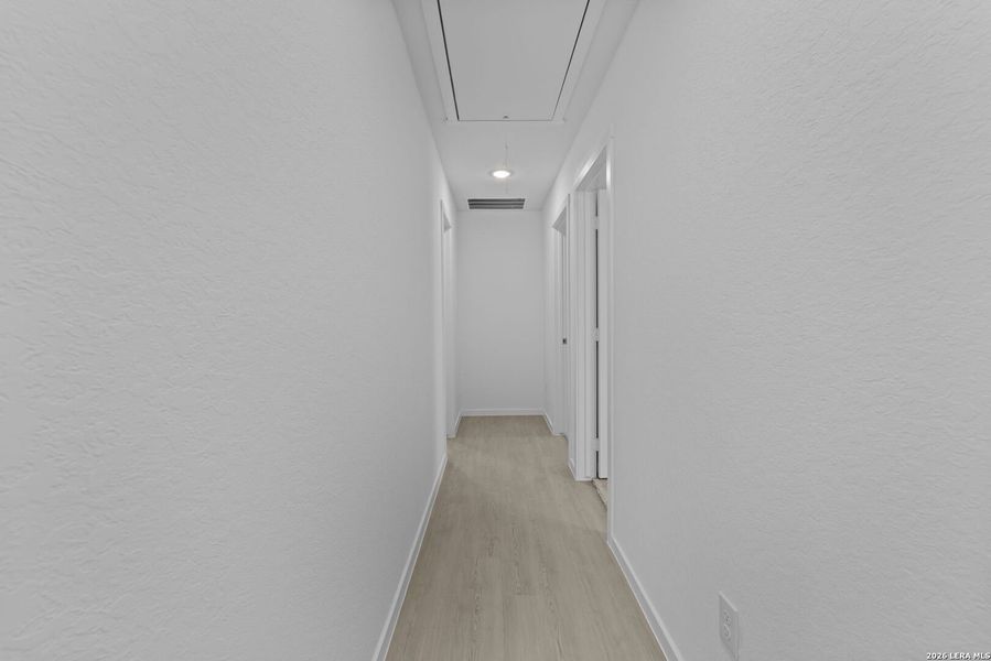 Spacious, unfurnished interior of a new home in Higdon Crossing, San Antonio (Image 11).
