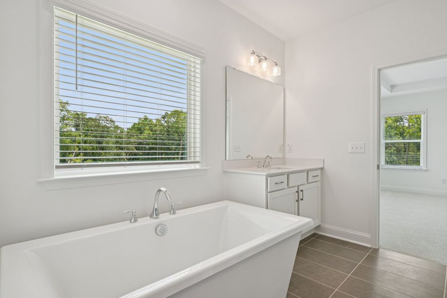 Representative furnished interior of a home built from the Jordan by Ashton Woods in Rowland's Grant, Fuquay Varina (Image 15).