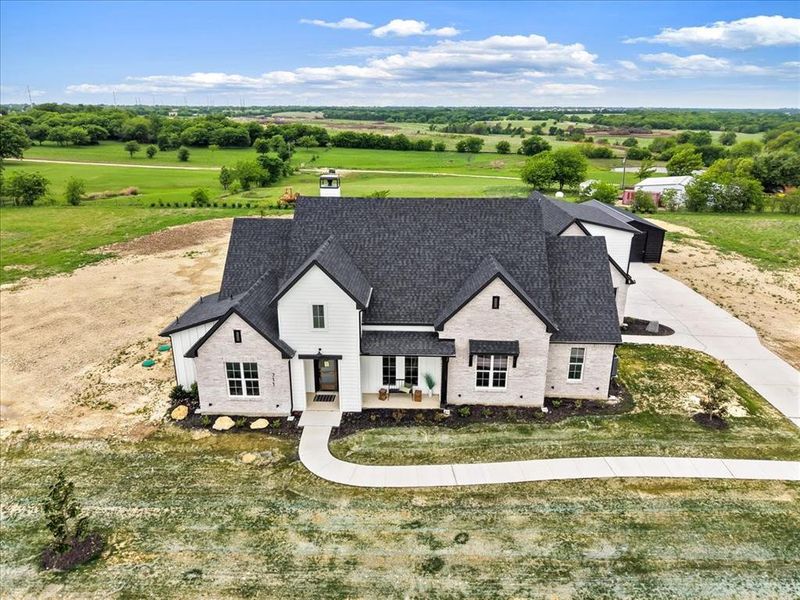 Front exterior of a new home in , Justin, TX, highlighting curb appeal (Image 28).
