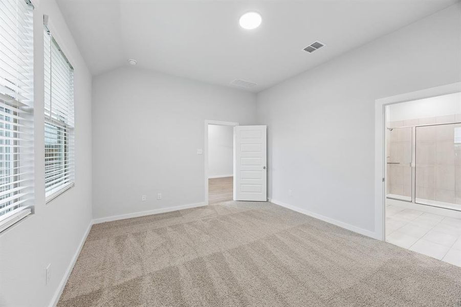 Primary Suite in the Cedar home plan by Trophy Signature Homes – REPRESENTATIVE PHOTO